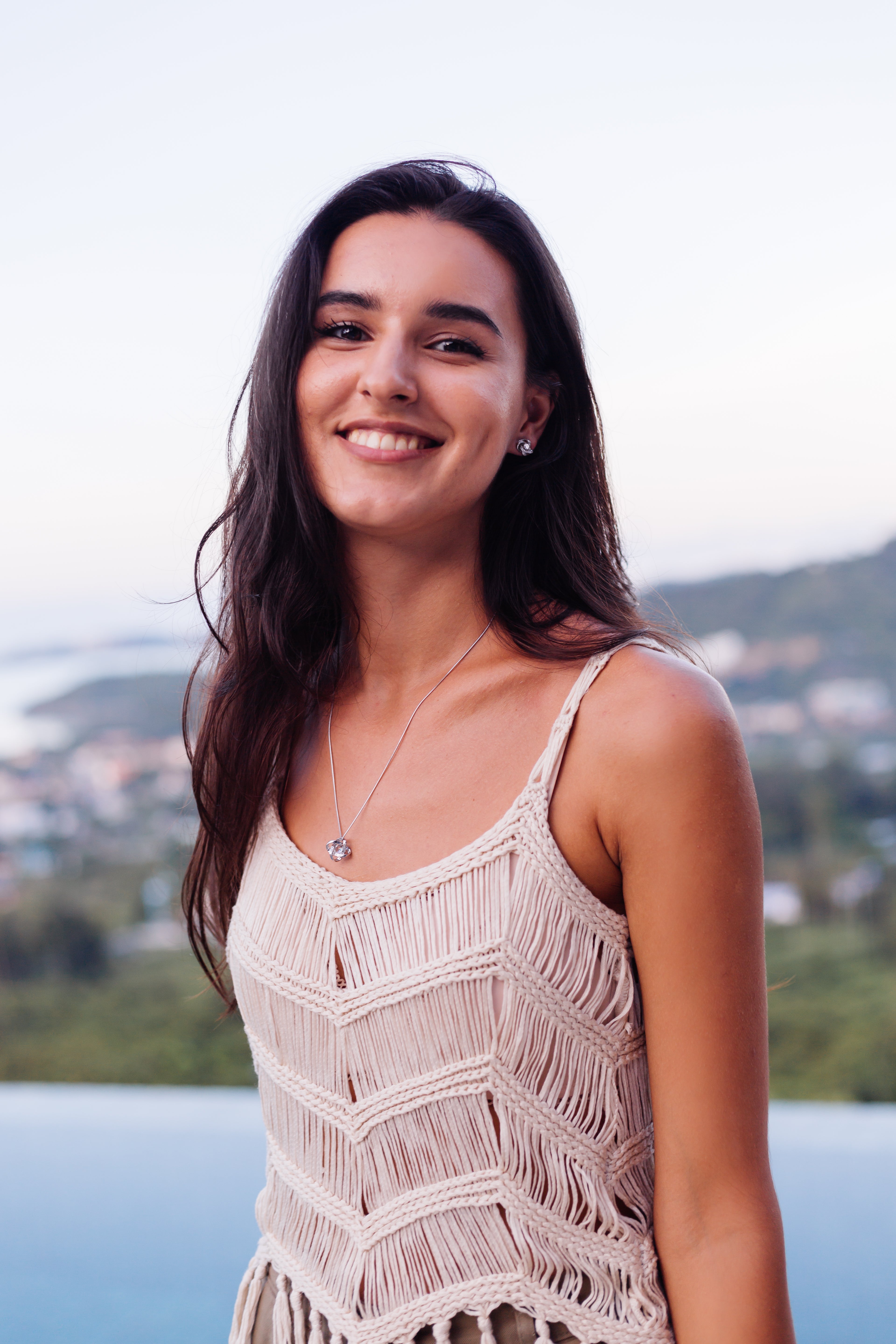 files/portrait-happy-caucasian-calm-romantic-woman-casual-look-with-long-hair-wearing-earings-necklace-background-amazing-beautiful-view-green-mountains.jpg